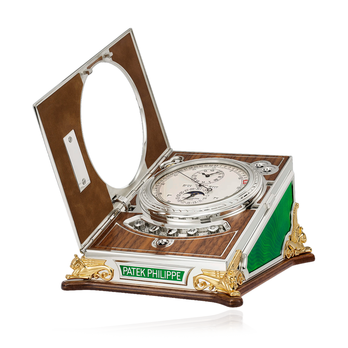 Patek Philippe compass in an open wooden box on a white background